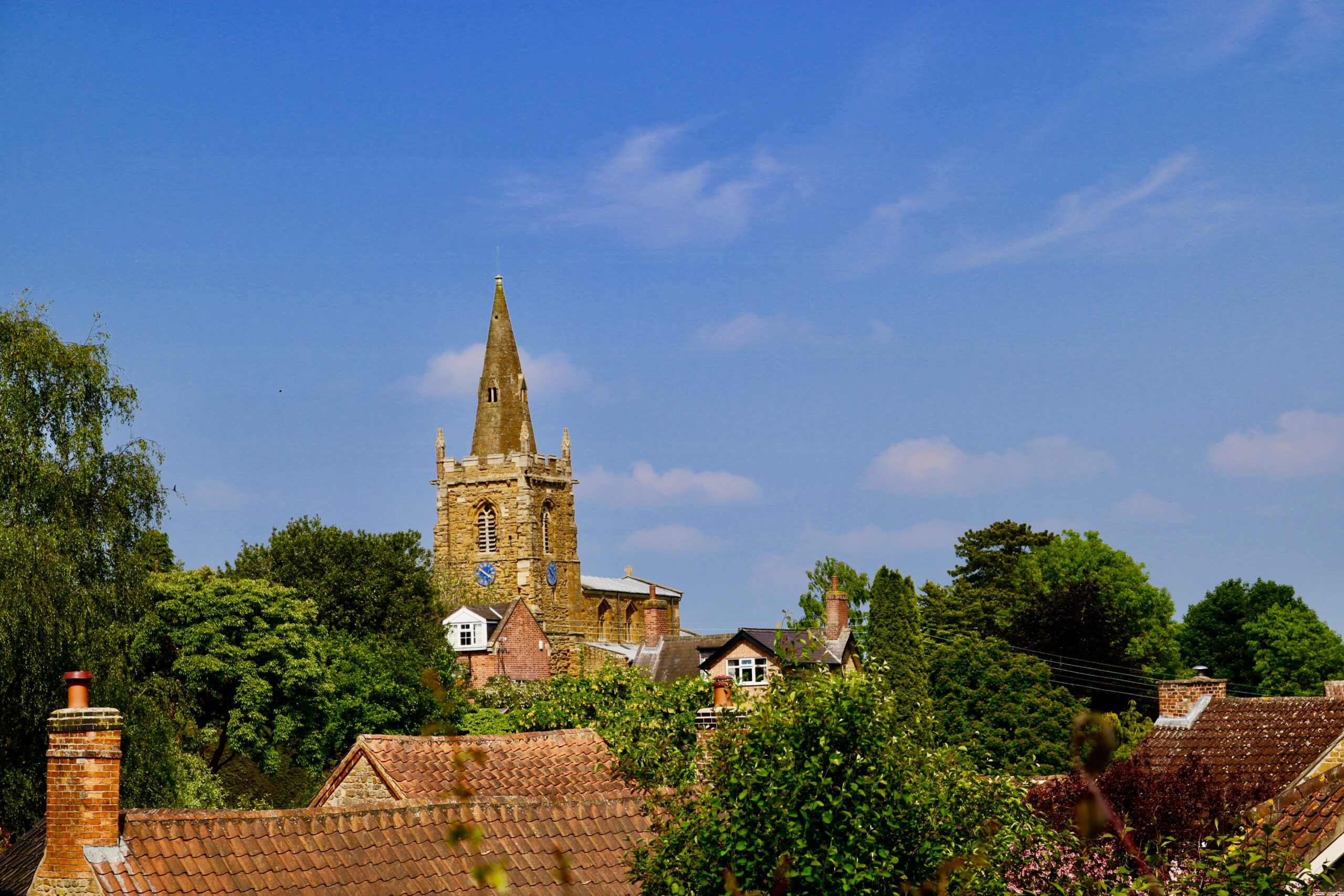 Historic old buildings in Grantham, showcasing traditional architecture with ornate facades and charming details, reflecting the town's rich heritage and history.